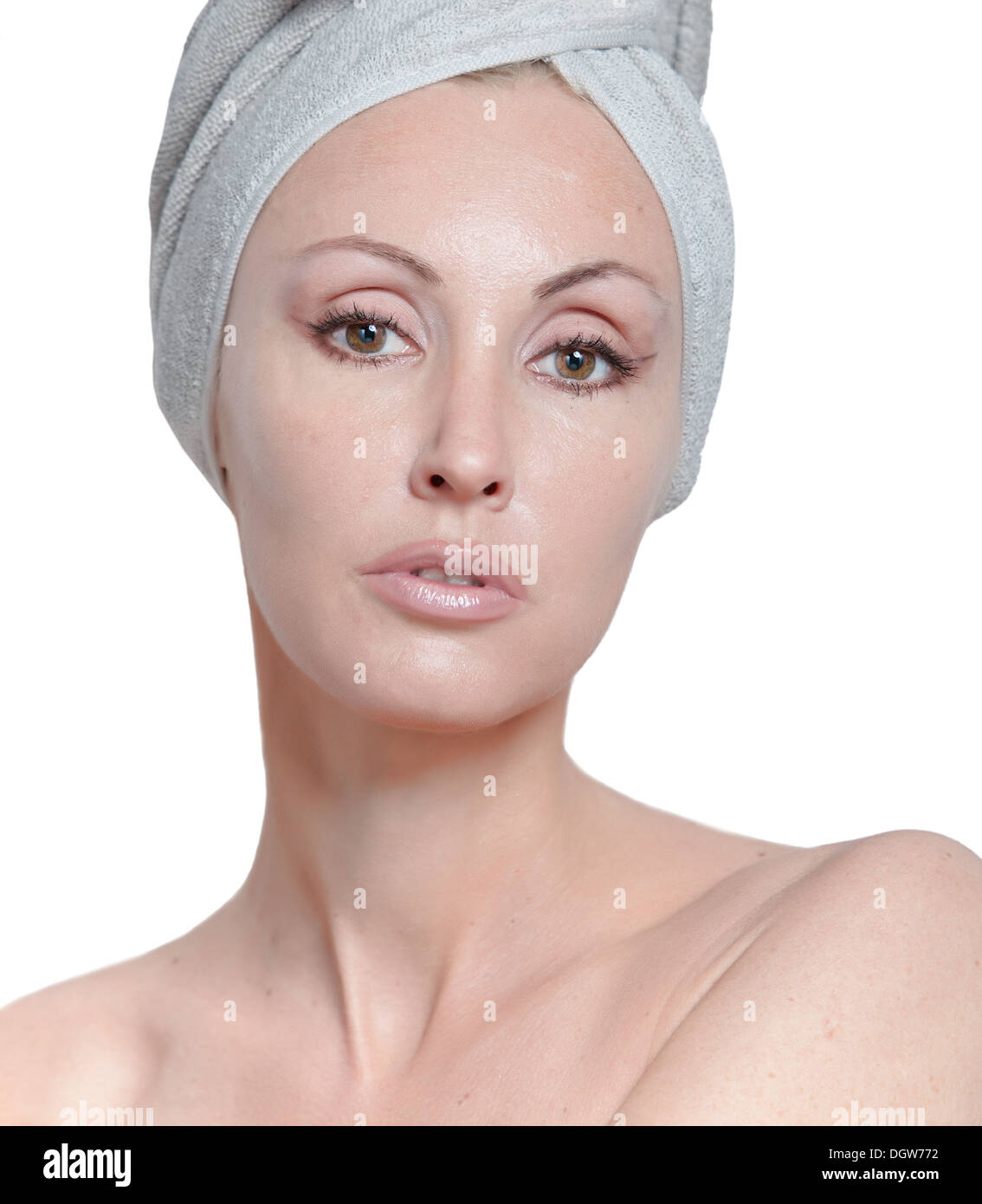 The beautiful young woman in towel Stock Photo - Alamy