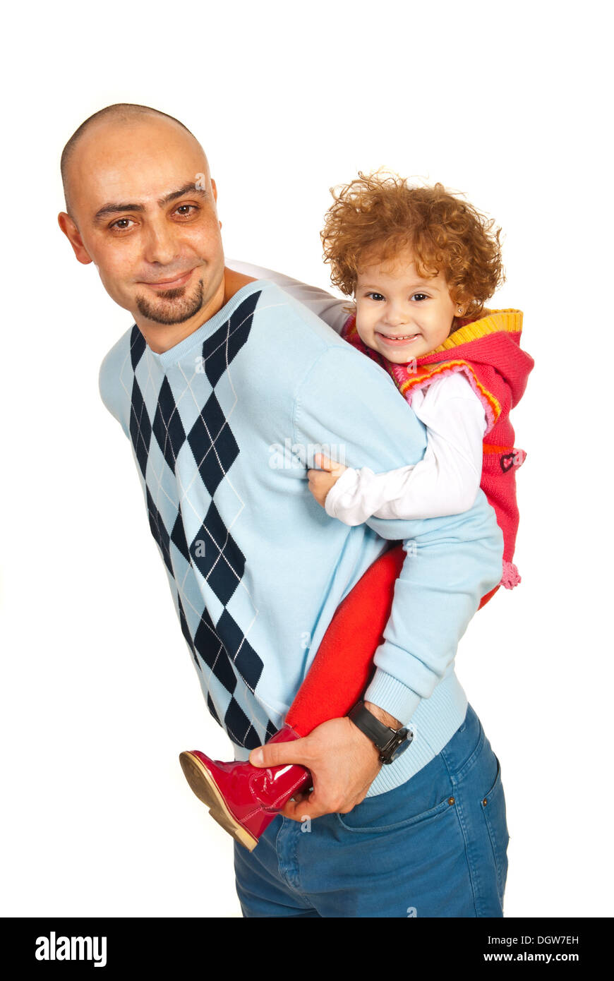 Happy father offering piggy back ride to his daughter Stock Photo