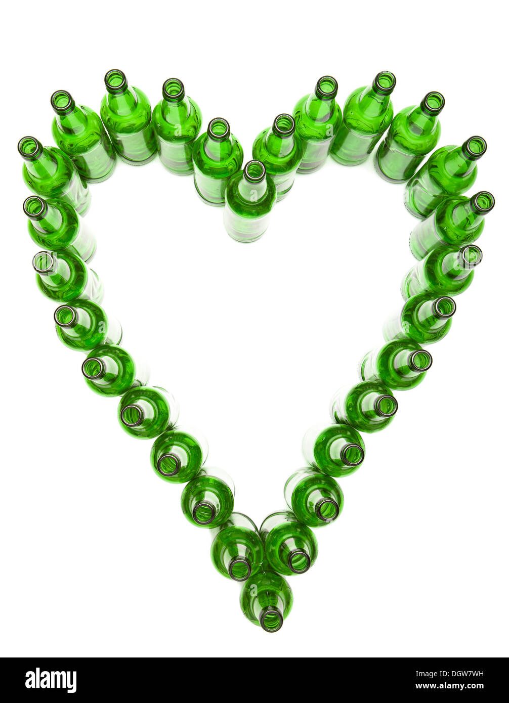 Heart from empty beer bottles Stock Photo