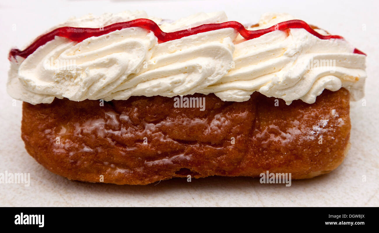 Donut doughnut topped with jam and cream Stock Photo Alamy