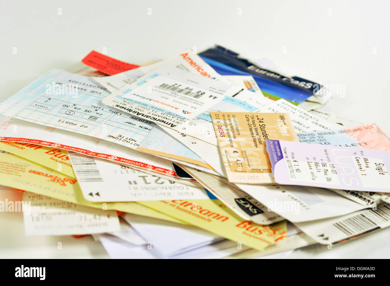 Pile of train, plane, and bus tickets Stock Photo