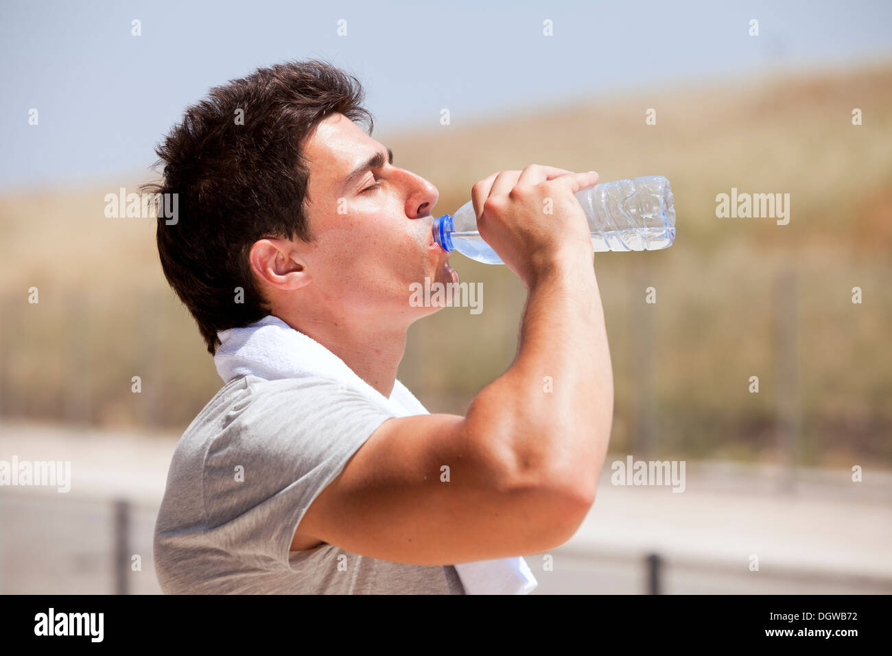 Athlete man tired after a long running sport event in the city Stock Photo
