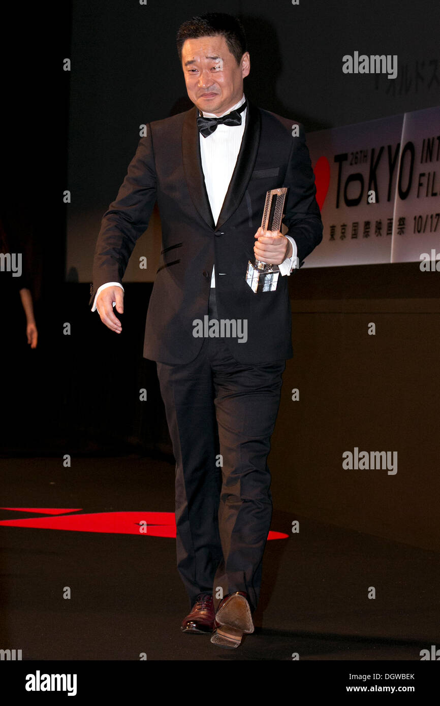 Tokyo, Japan. 25th Oct, 2013. The Actor of the movie 'To Live and Die in Ordors' Wang Jingchun receives the Best Actor Award at the Closing Ceremony of the 26th Tokyo International Film Festival in Roppongi Hills, Tokyo, Japan, October 25, 2013. © Aflo Co. Ltd./Alamy Live News Stock Photo