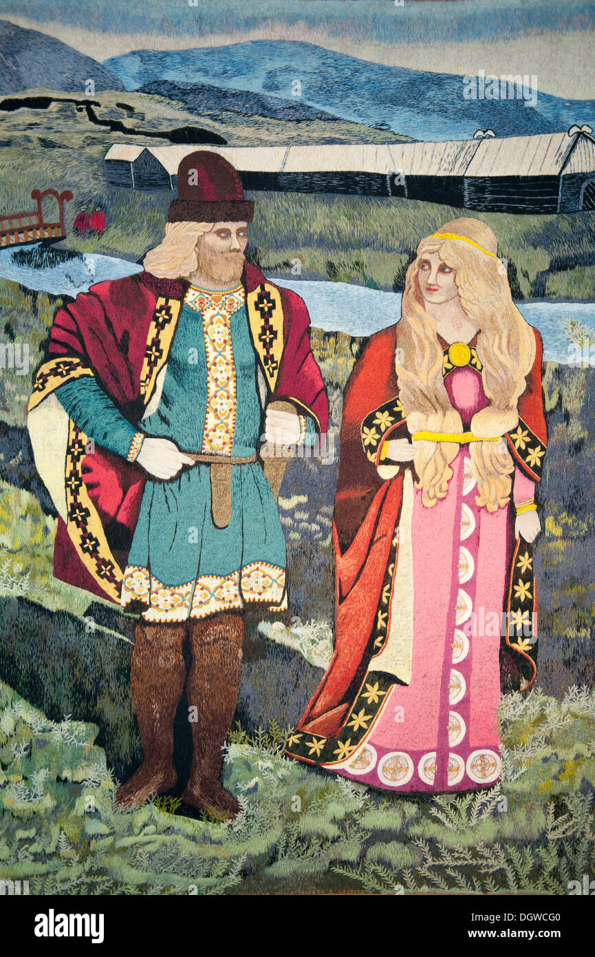 Icelandic couple from the old days of the sagas in typical dress, picture in a tapestry, Skógar open-air museum, Iceland Stock Photo