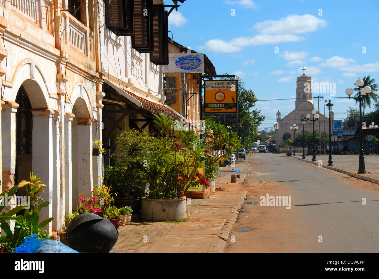 French colonial era, old houses, market place, Christian Church of St. Theresa, Savannakhet, Laos, Southeast Asia, Asia Stock Photo