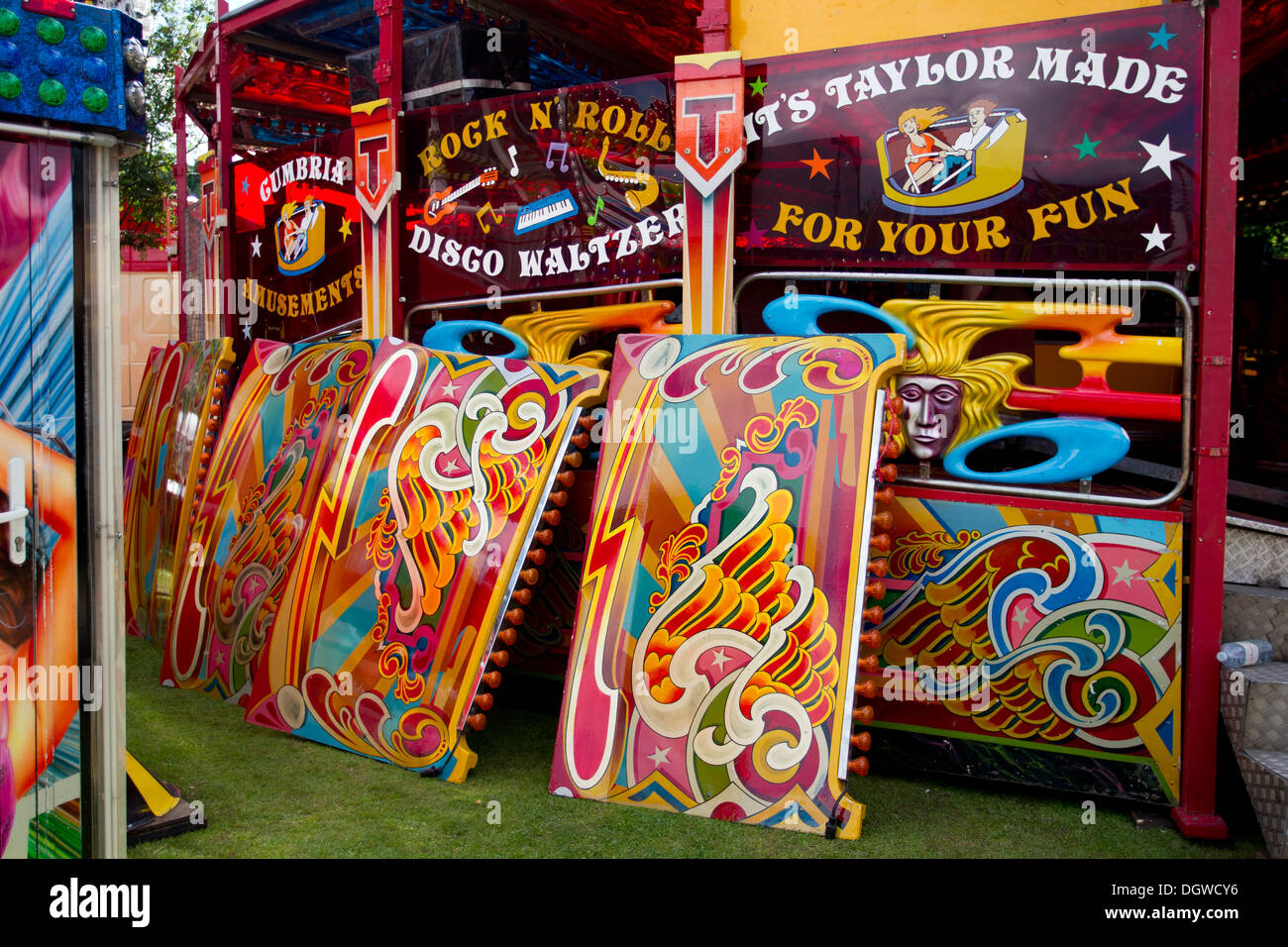 Some of Taylors Cumbria Amusements funfair rides and stalls on the Glebe Bowness on Windermere Stock Photo