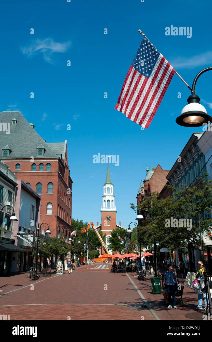 American flag, Unitarian Church at the end of Church Street, pedestrianised zone, Burlington, Vermont, New England, USA Stock Photo