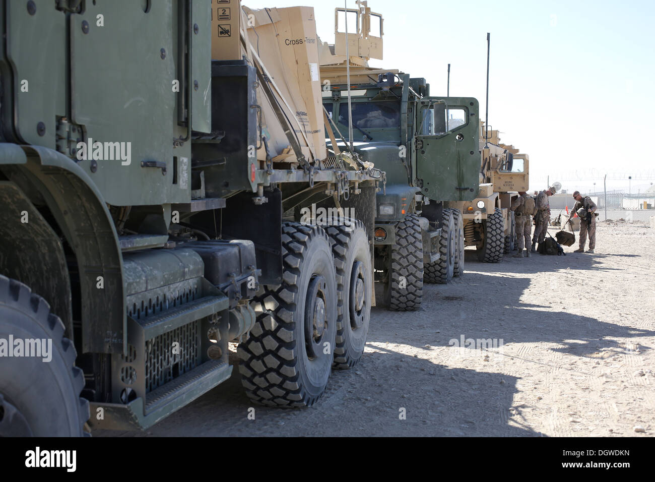 U.S. Marines with Headquarters and Support Company, 1st Battalion, 9th Marine Regiment, prepare for a convoy from Camp Leatherneck to Patrol Base Boldak, Helmand province, Afghanistan, Oct. 18, 2013. The convoy was conducted to resupply PB Boldak. Stock Photo