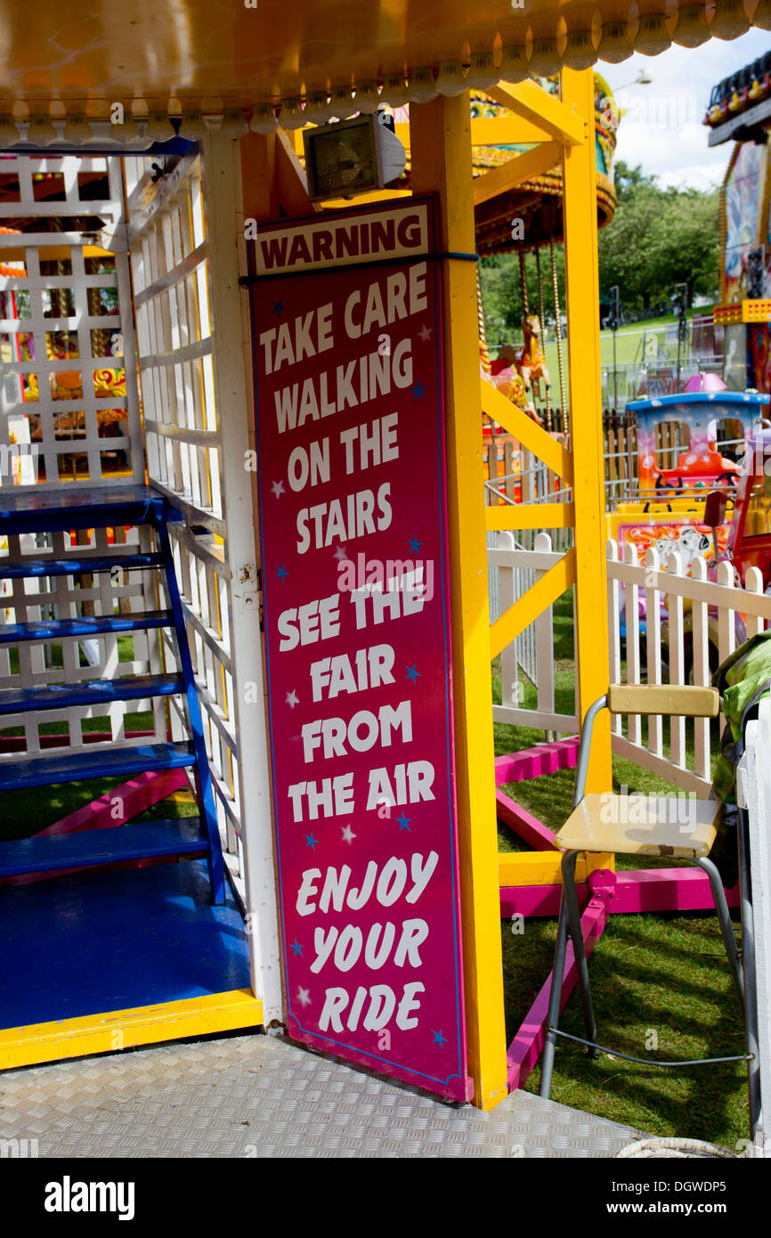 Some of Taylors Cumbria Amusements funfair rides and stalls on the Glebe Bowness on Windermere Stock Photo