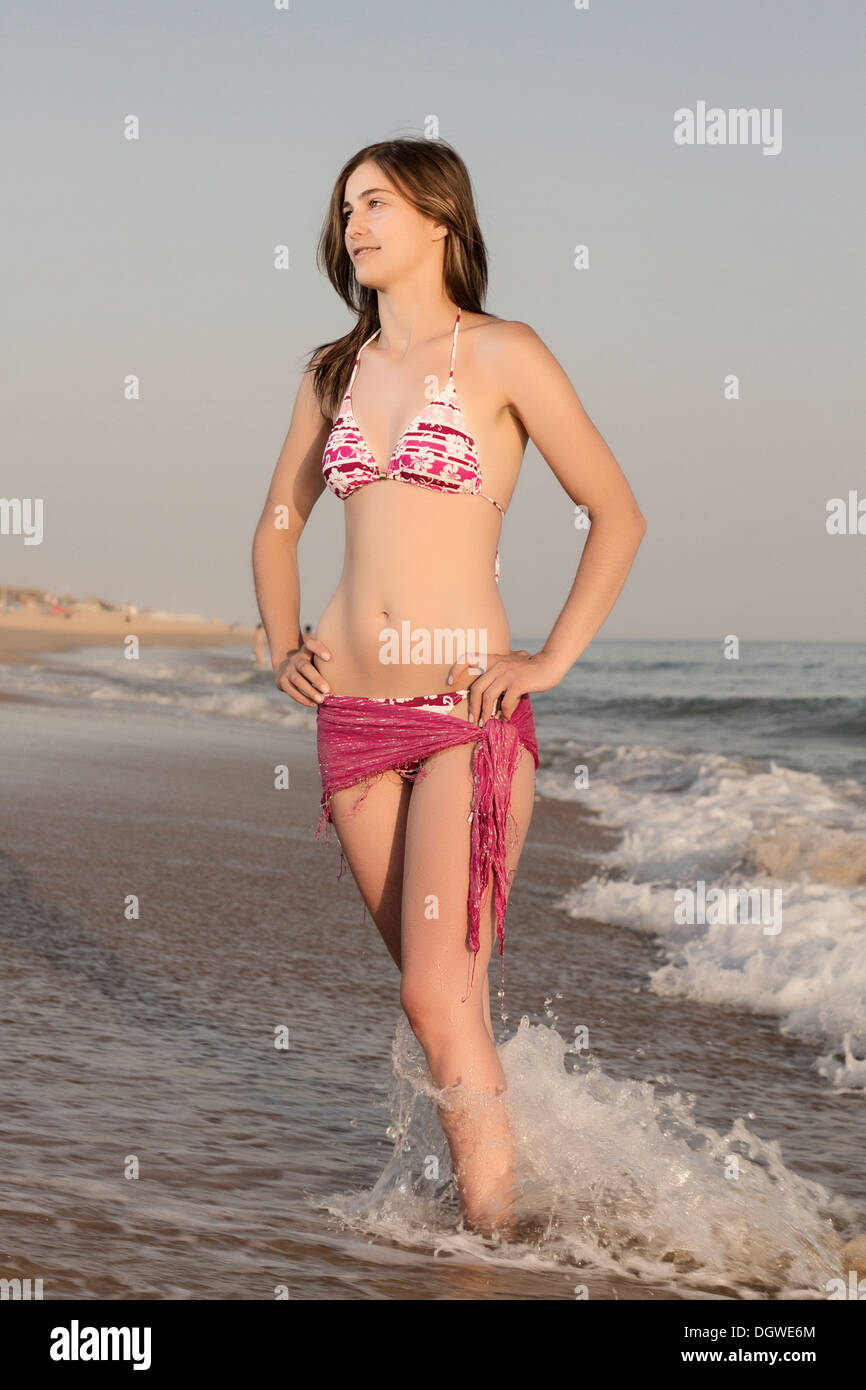 Young arabic woman with beautiful body in swimwear smiling on a tropical  beach. - a Royalty Free Stock Photo from Photocase