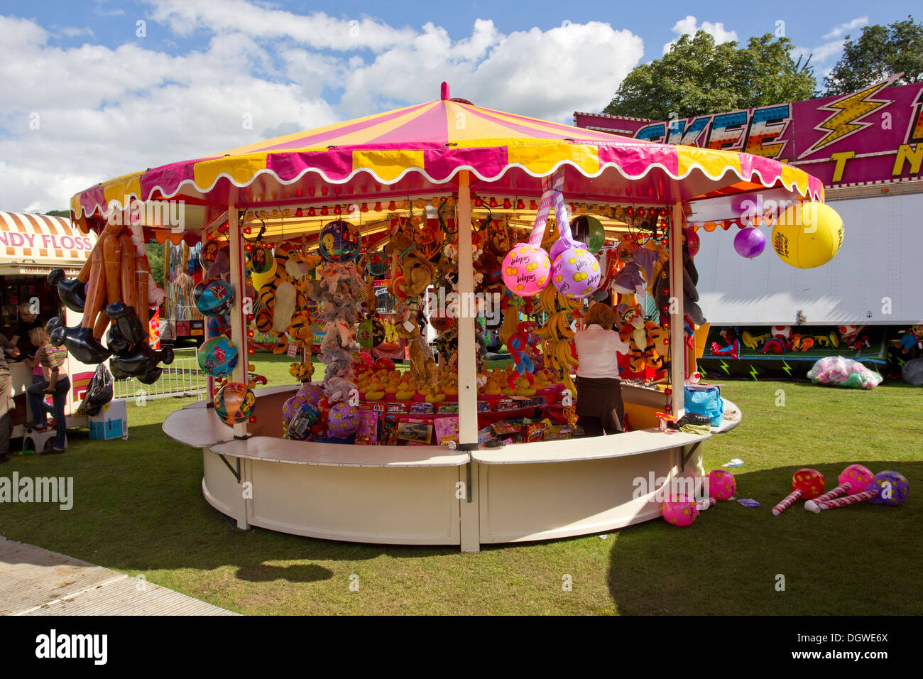 Some of Taylors Cumbria Amusements funfair rides and stalls on the Glebe Bowness on Windermere Stock Photo