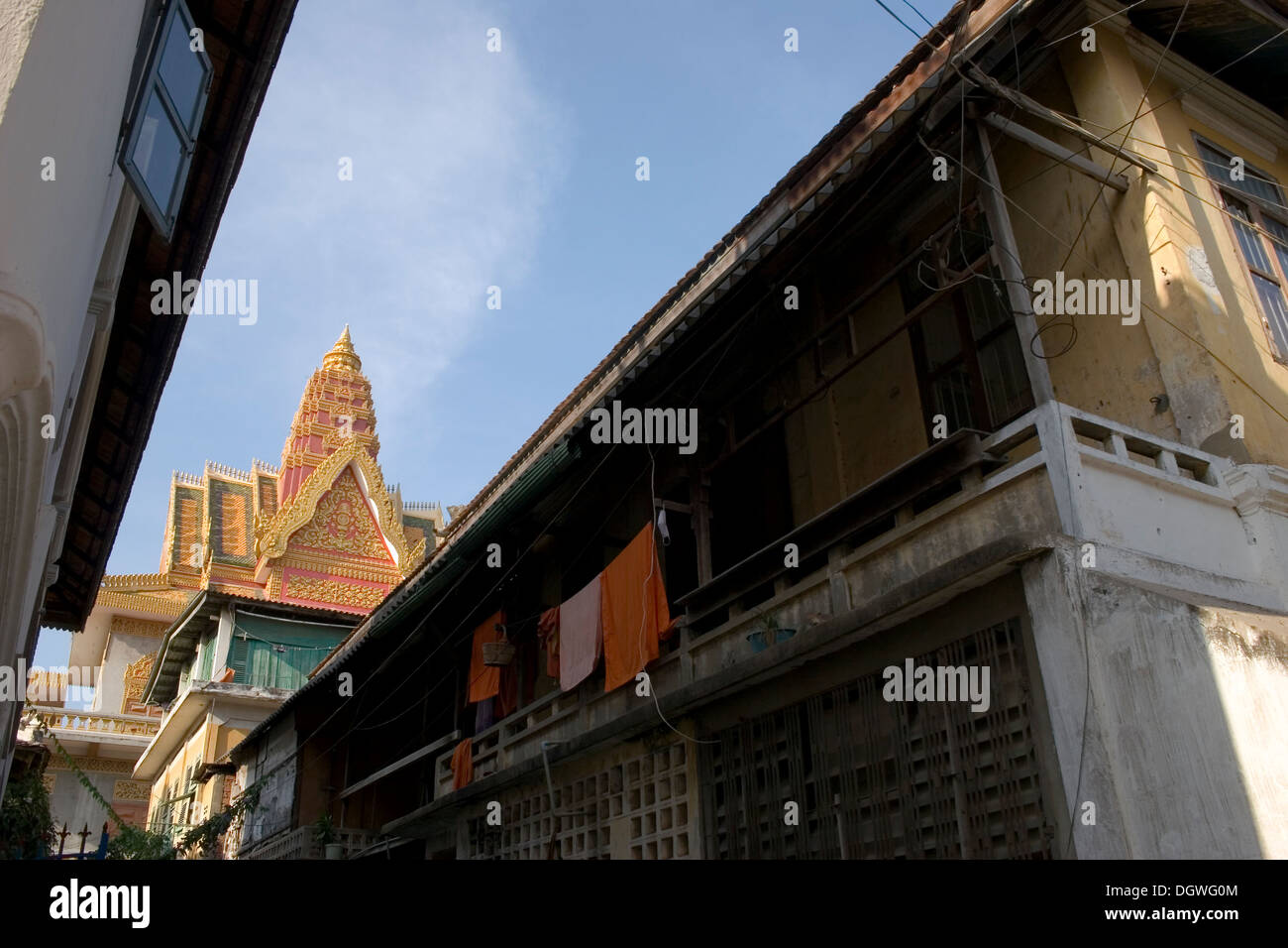 Buddhist monk's living quarters stand in the shadows of a Buddhist
