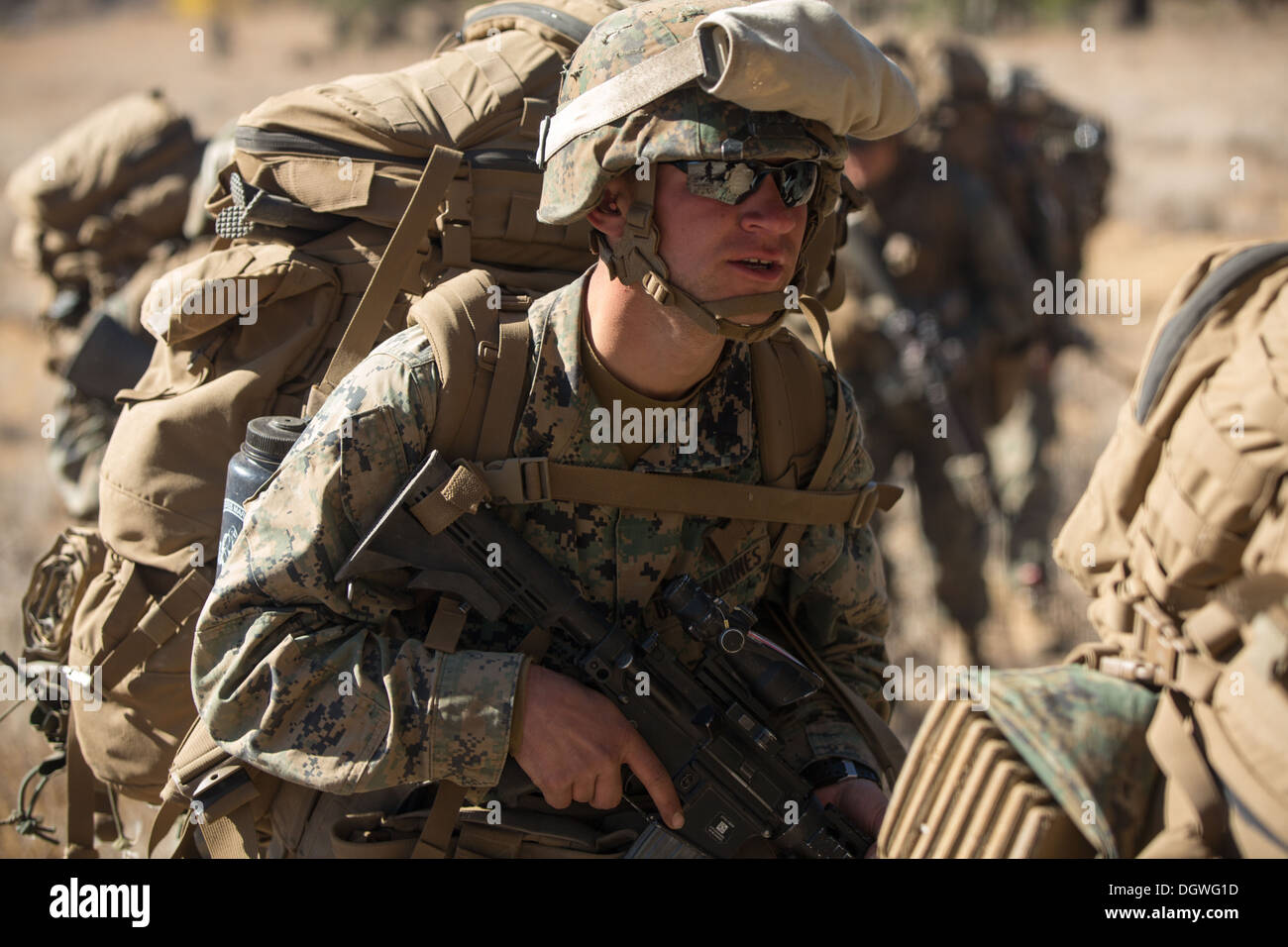 U.S. Marines from 1st Battalion, 5th Marine Regiment (1/5), 1st Marine Division from Camp Pendleton, Calif. board a CH-53E Super Stock Photo