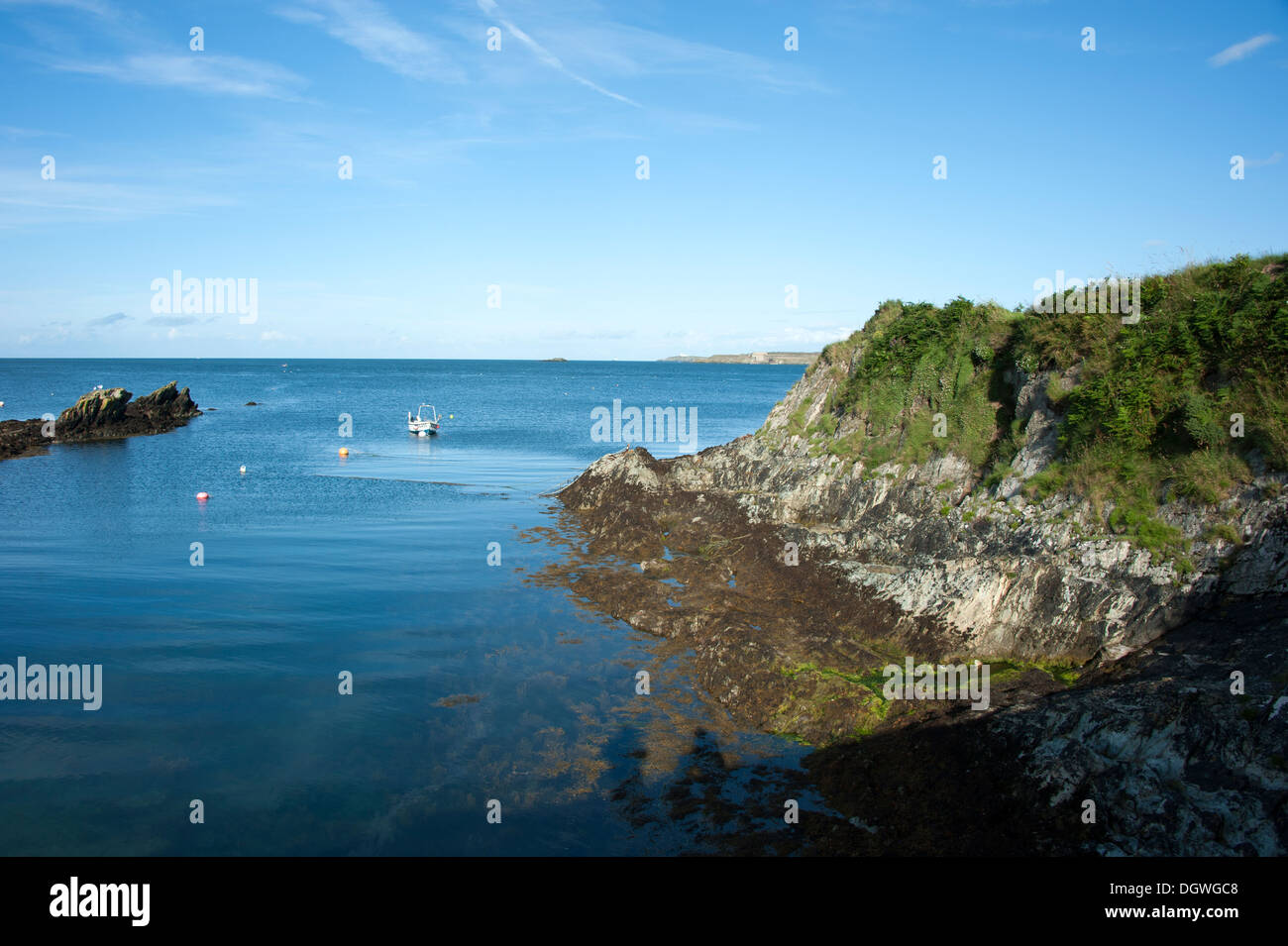 Blue Sky calm water Bull Bay Anglesey North Wales UK Stock Photo - Alamy