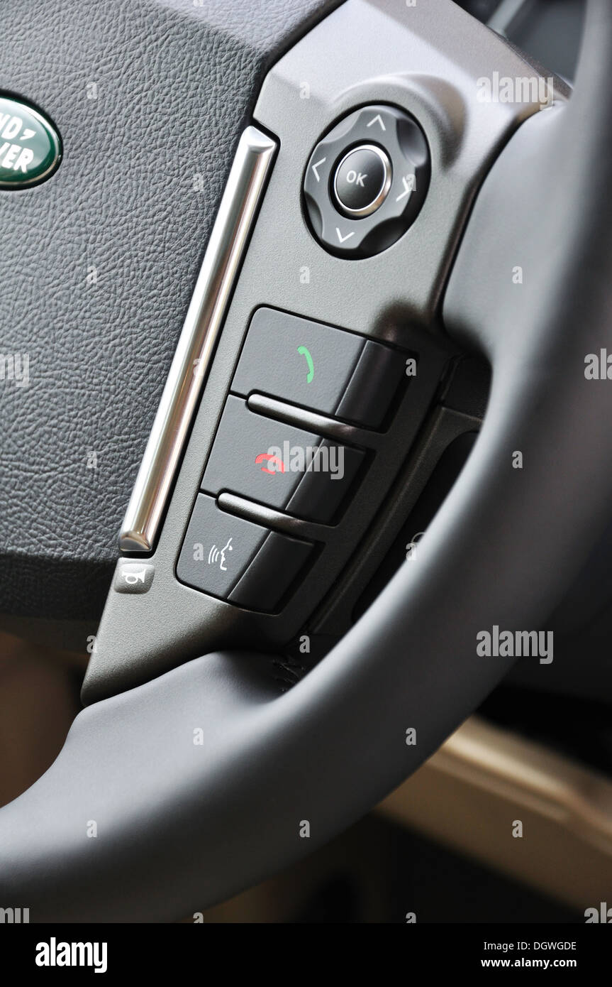 Land Rover steering wheel detail showing phone buttons Stock Photo Alamy