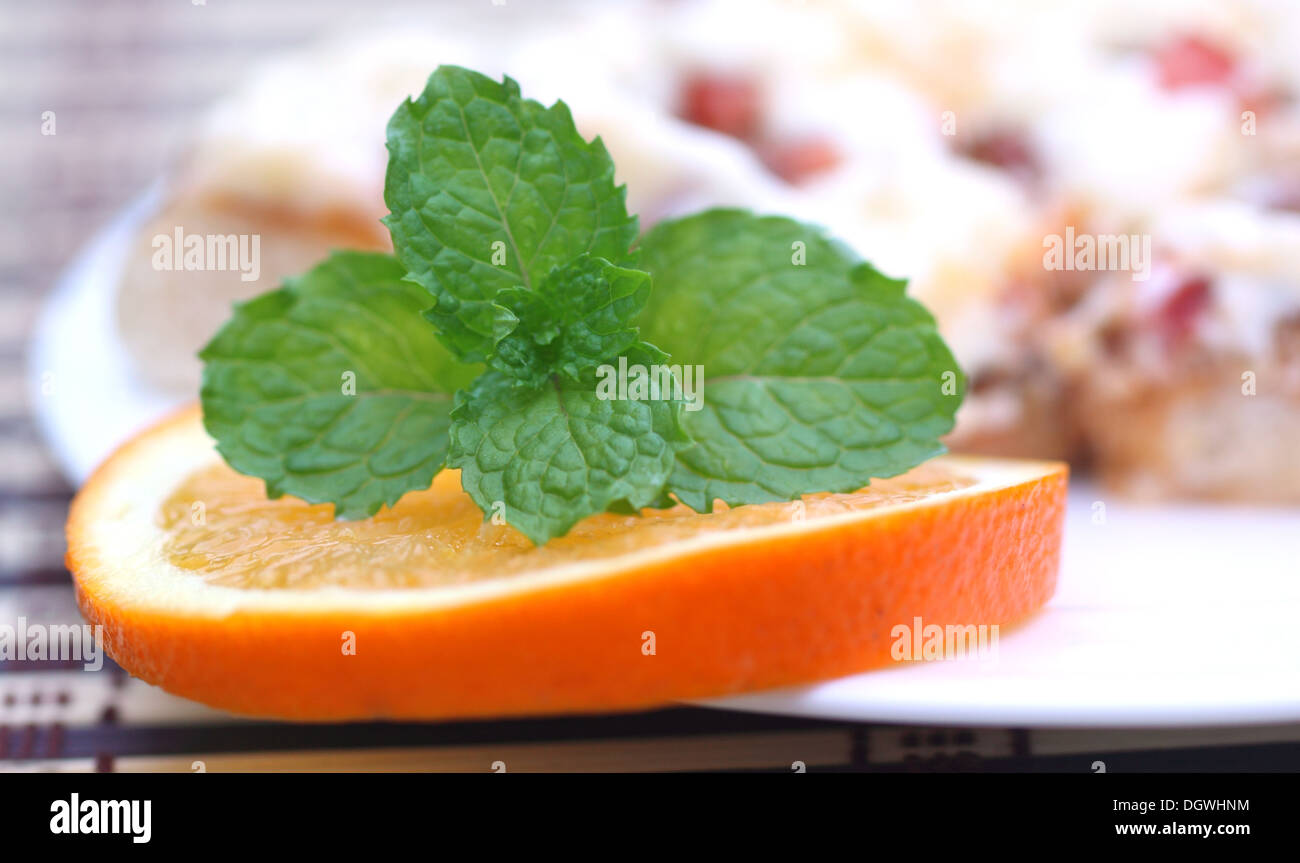 Pizza with mint leaves and orange slice Stock Photo Alamy