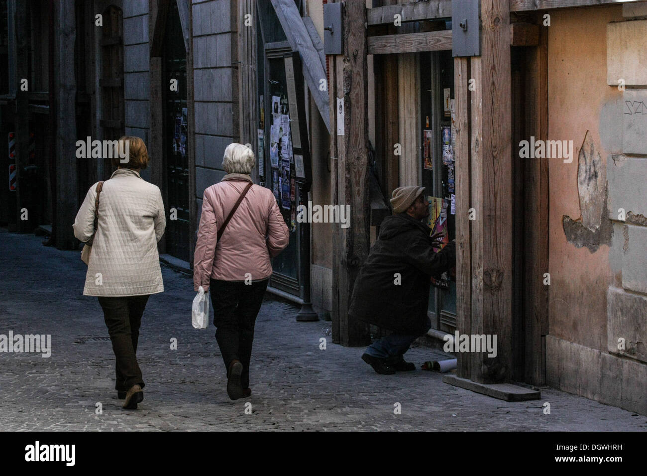 Oct. 26, 2013 - L'Aquila, Italy - People walk on October 25, 2013 in the historic area of L'Aquila, destroyed by an earthquake four years ago, on April 6, 2009. Four years after, the historic center is still abandoned, the reconstruction process is slow outside of commercial premises and the city's churches and monuments are still covered in scaffolding.Photo: Manuel Romano/NurPhoto (Credit Image: © Manuel Romano/NurPhoto/ZUMAPRESS.com) Stock Photo