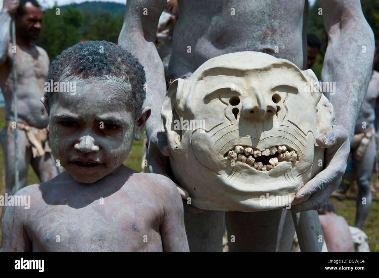 Boy from the tribe of the Mudmen during the traditional Sing Sing in the highlands, Enga, Highlands, Papua New Guinea Stock Photo