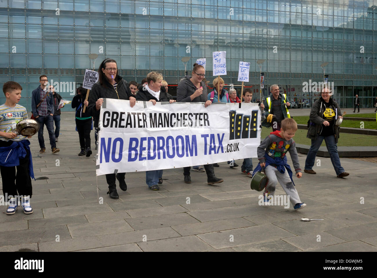 Manchester, UK. 26th Oct, 2013. A young boy drops his spoon as proteters show their displeasure at the Coalition Government  by protesting against the bedroom tax and government measures, which are making the life of the ordinary citizen worse than before.  Credit:  John Fryer/Alamy Live News Stock Photo