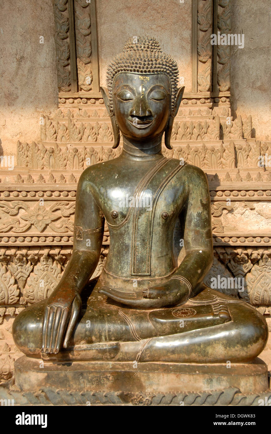 Theravada Buddhism, ancient Buddha statue in bronze in meditation, Bhumisparsha Mudra, Bhumisparshamudra Stock Photo