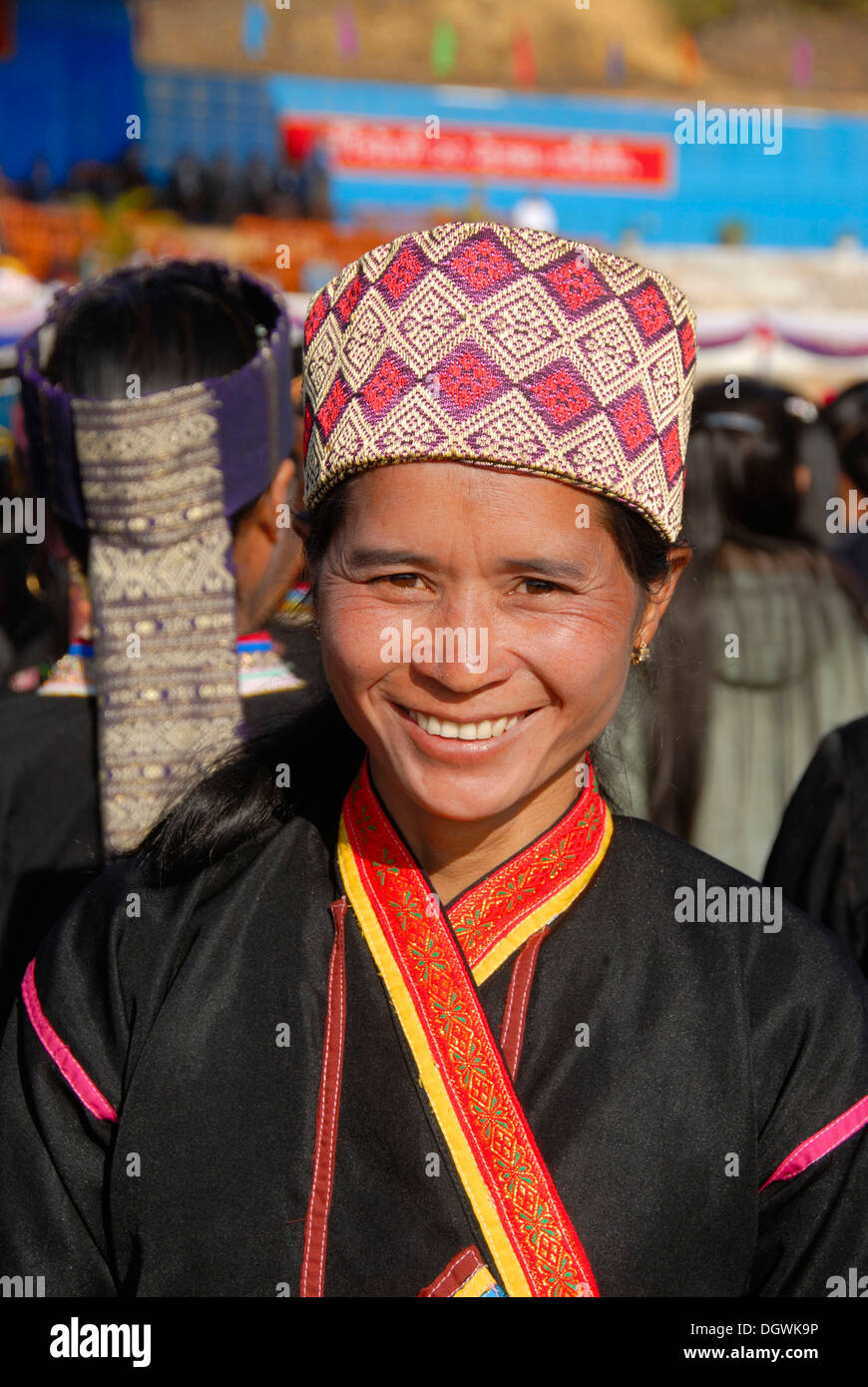 Portrait, smiling woman of the Khmu ethnic group, traditional clothing