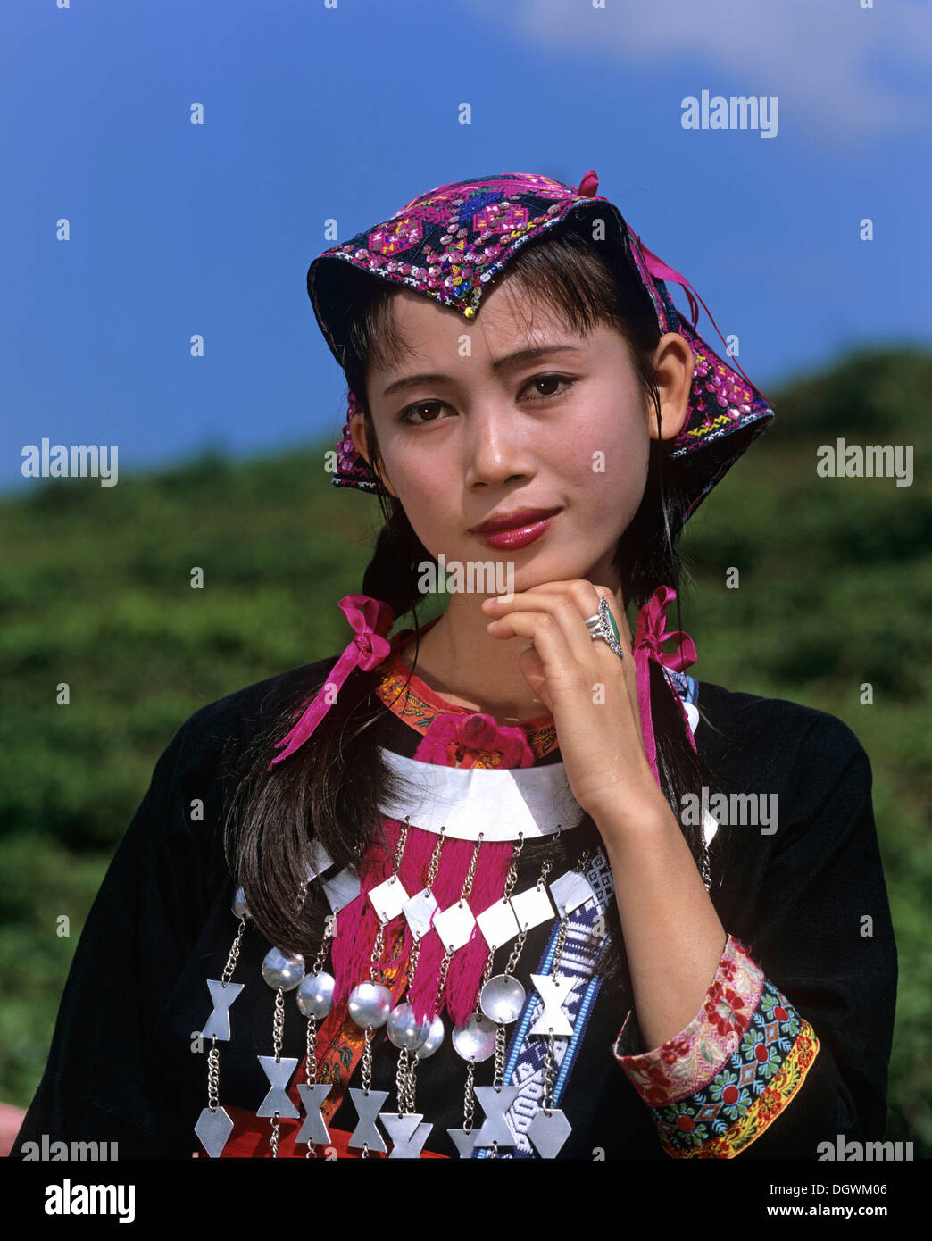 Young Miao woman wearing a traditional ethnic costume, portrait, Hainan, China, Asia Stock Photo