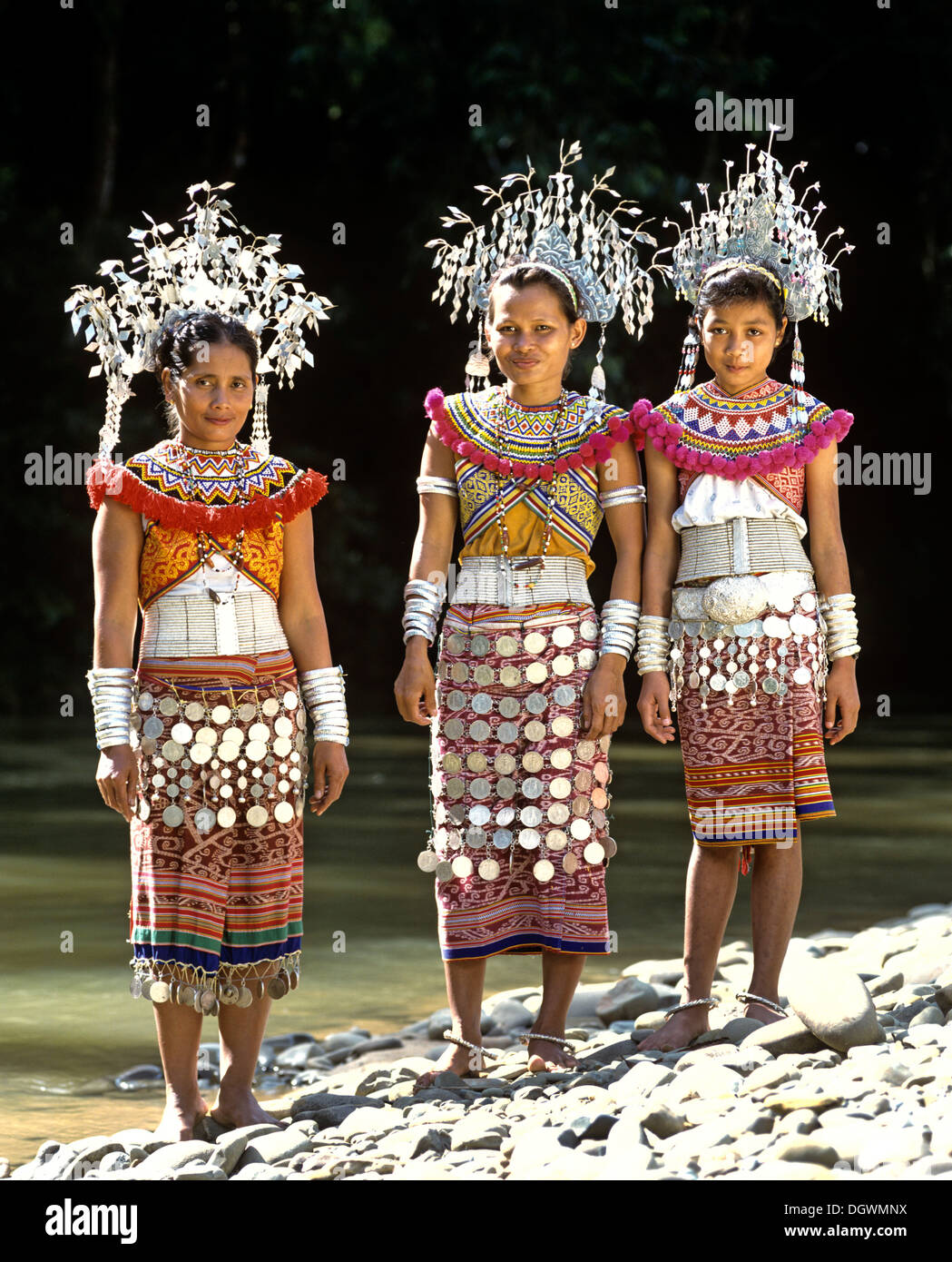 Women of the ethnic group of the Iban people wearing traditional dress, Skrang River, Rajang, Sarawak, Borneo, Malaysia Stock Photo