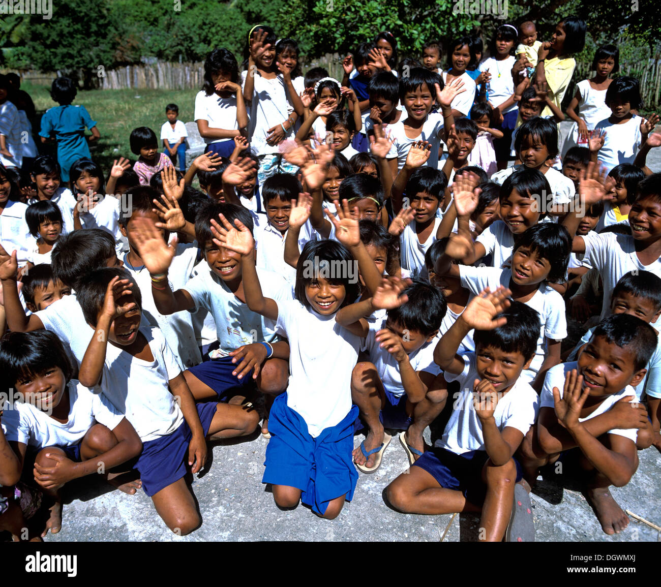 School children waving, Linapacan Strait, El Nido, Palawan, Mimaropa, Philippines Stock Photo