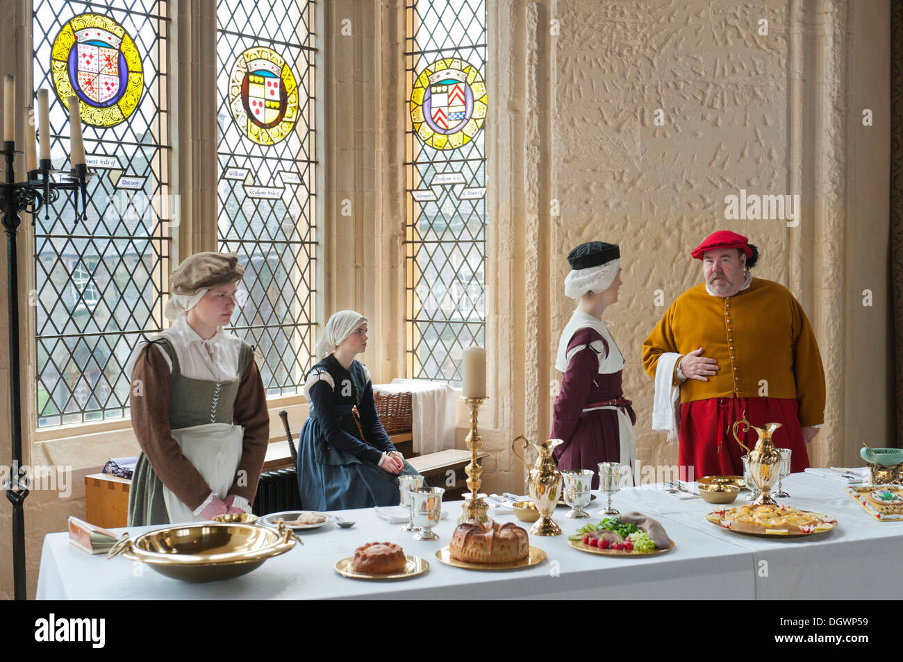 Drama, set table, four people wearing medieval clothes, Stirling Castle Palace, Stirling, Scotland, United Kingdom Stock Photo