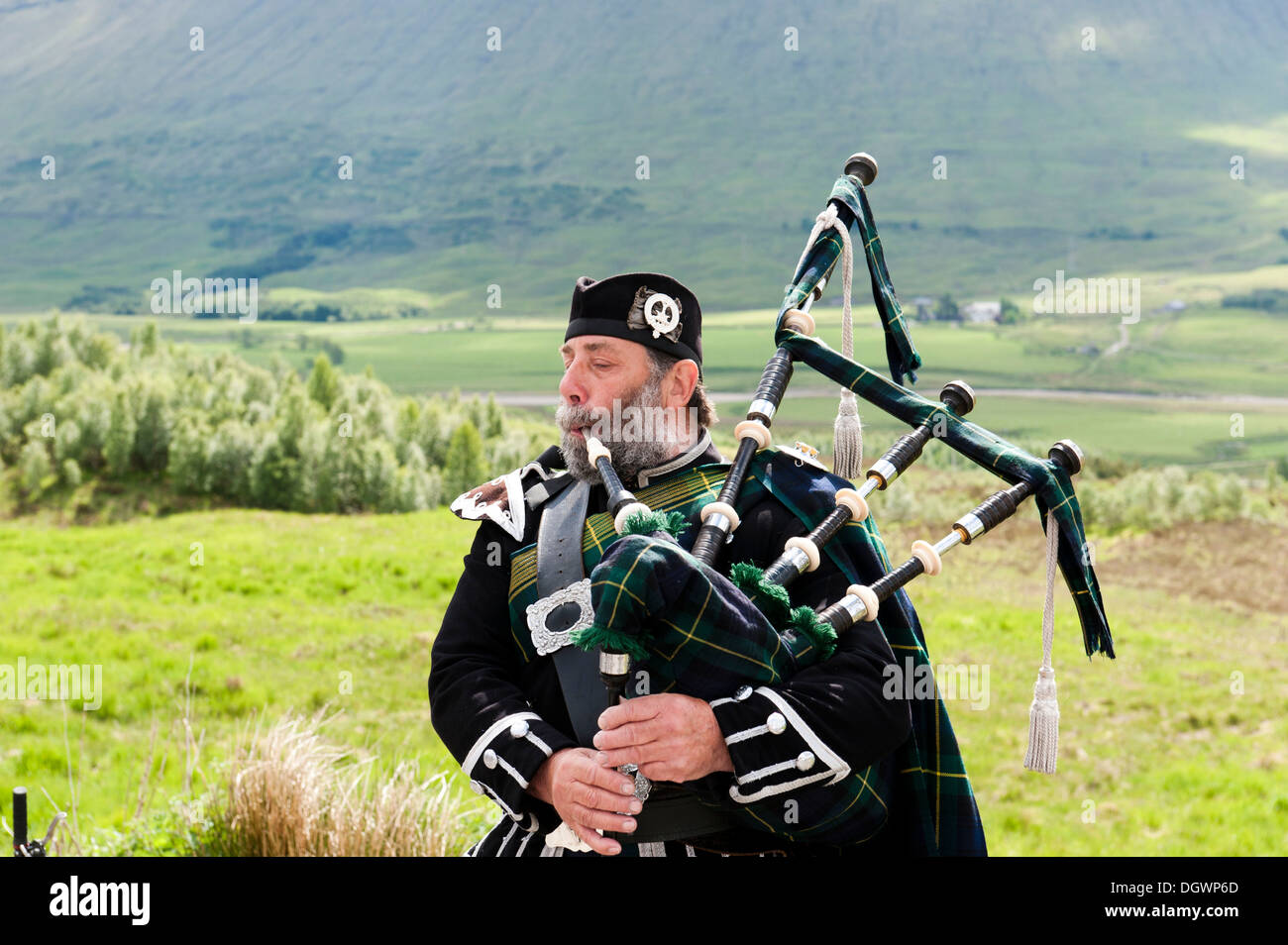 Bagpiper in the Scottish Highlands, Highland, Highlands, Rannoch Moor, Schottland, Scotland, United Kingdom Stock Photo