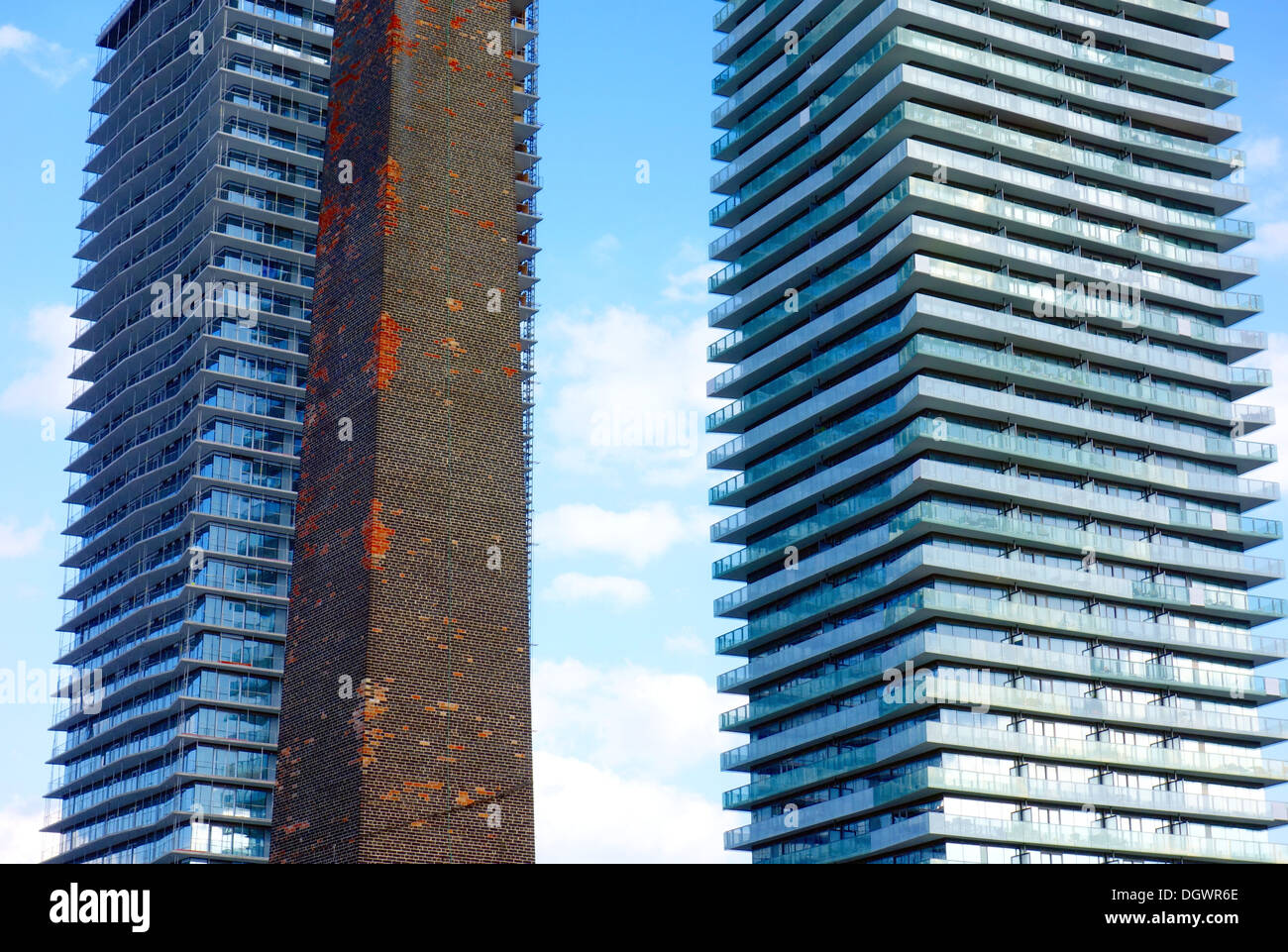 Two modern condo buildings and an old stack pipe in Toronto, Canada Stock Photo