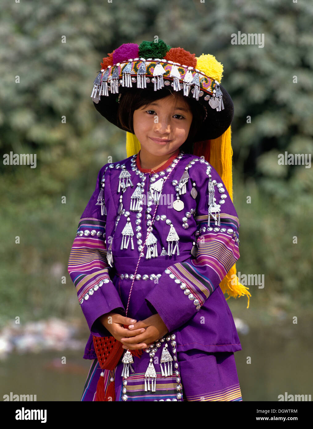 Lisu girl wearing a colourful headdress and the traditional costume of ...