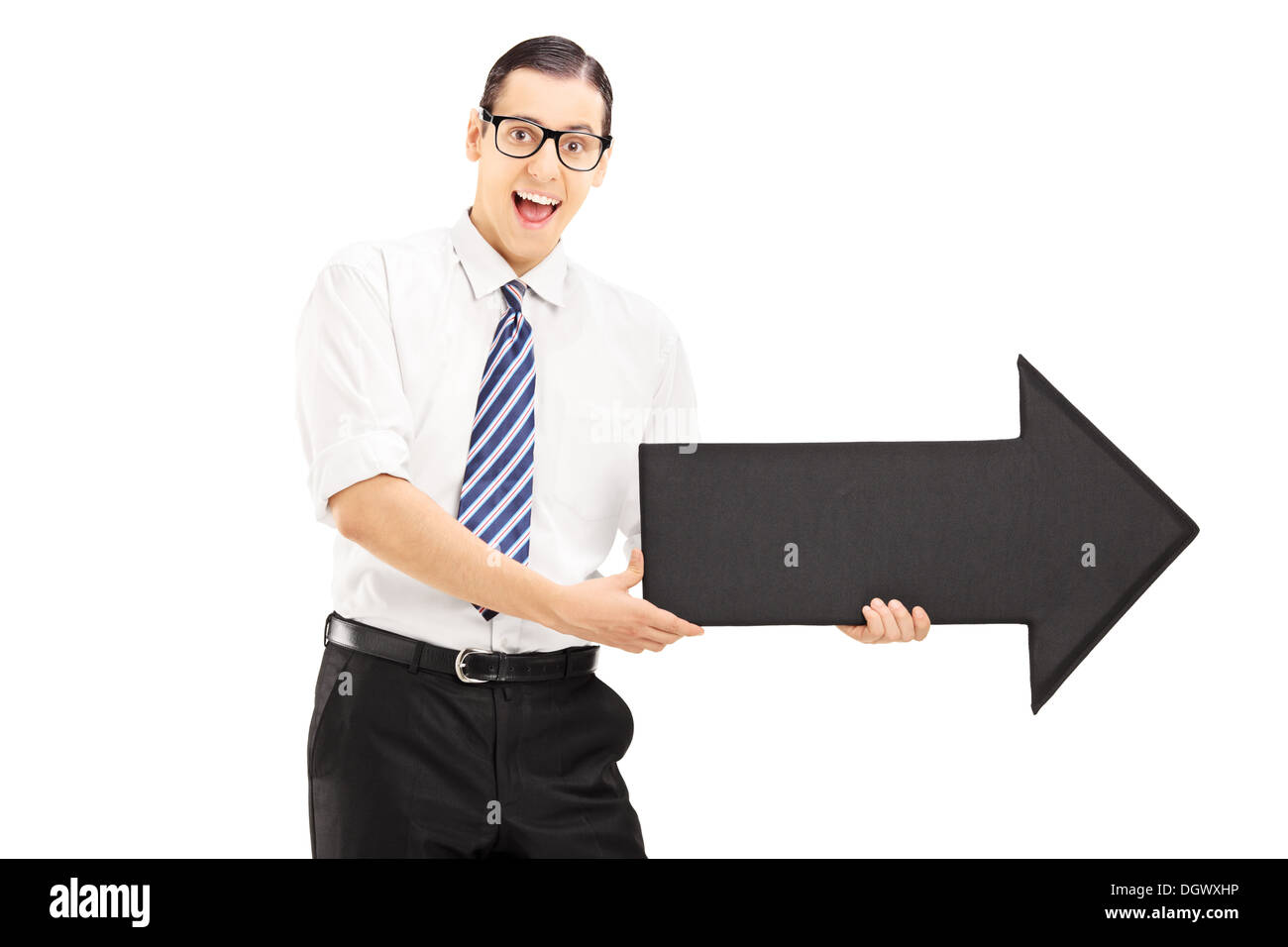 Young smiling man with glasses holding a big black arrow pointing to ...