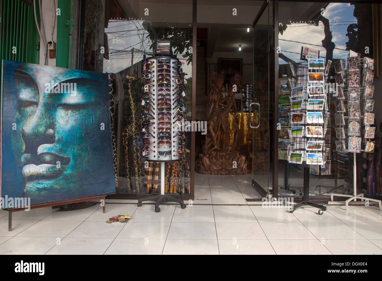 Shop display Ubud Bali Indonesia sell art clothes window cards posters ...