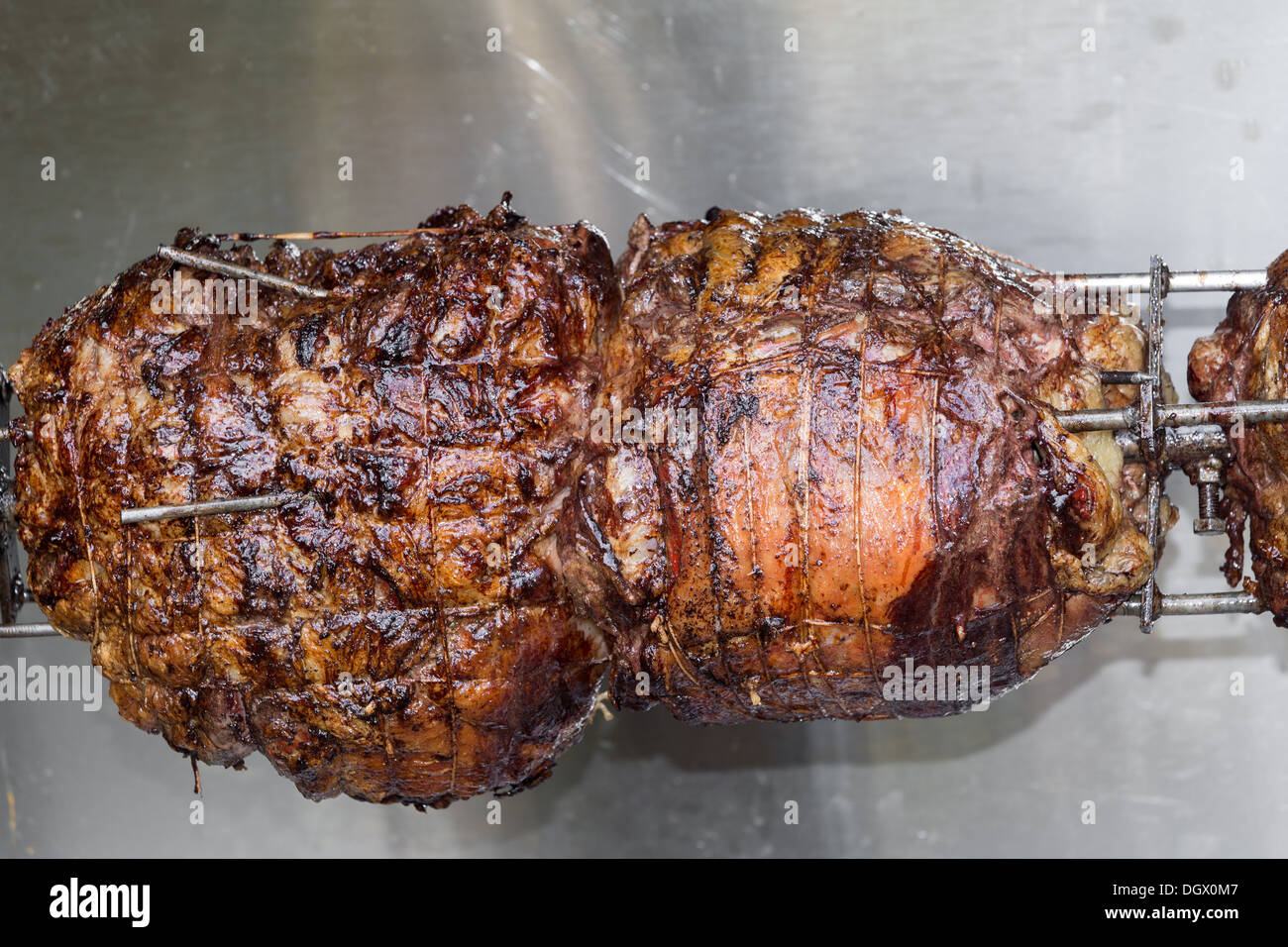 Spit roast meat cooking hires stock photography and images Alamy