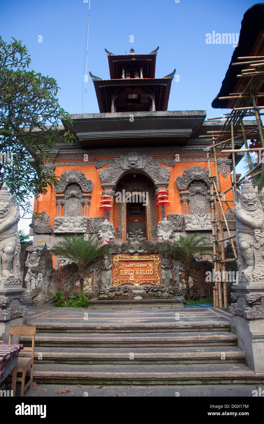 Religion decoration sculpture Ubud Bali Indonesia decorative stone carve carving hand made tradition ceremony ceremonial orange Stock Photo