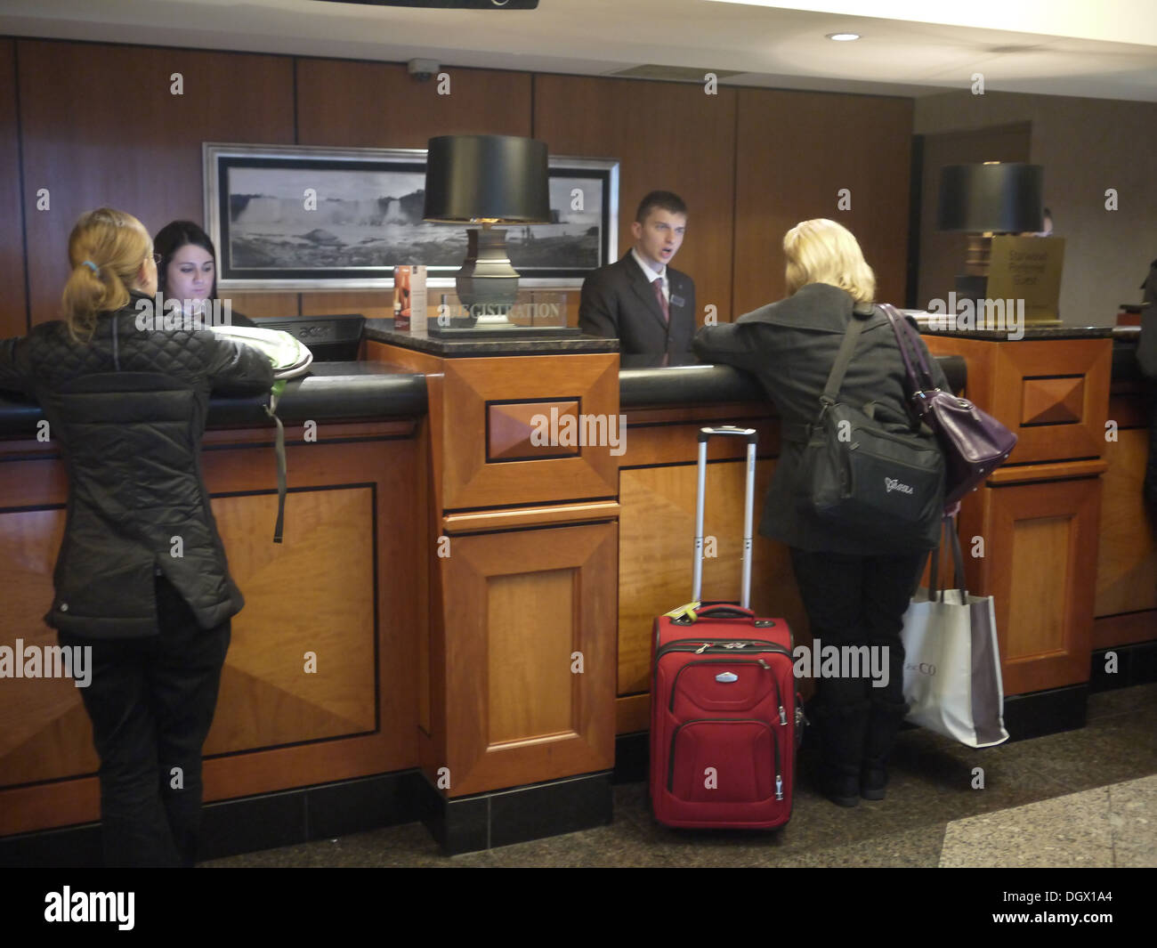 sheraton hotel check in counter lobby Stock Photo