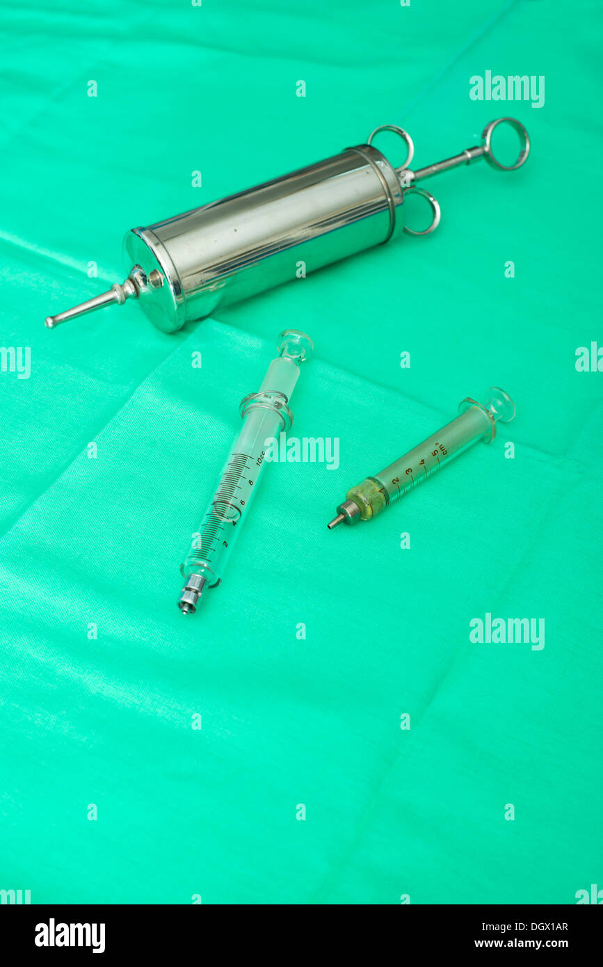 Metal glass syringe hi-res stock photography and images - Alamy