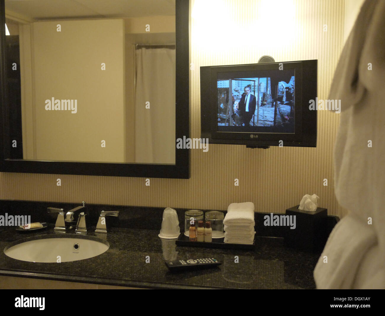 watching tv inside bathroom sheraton hotel Stock Photo