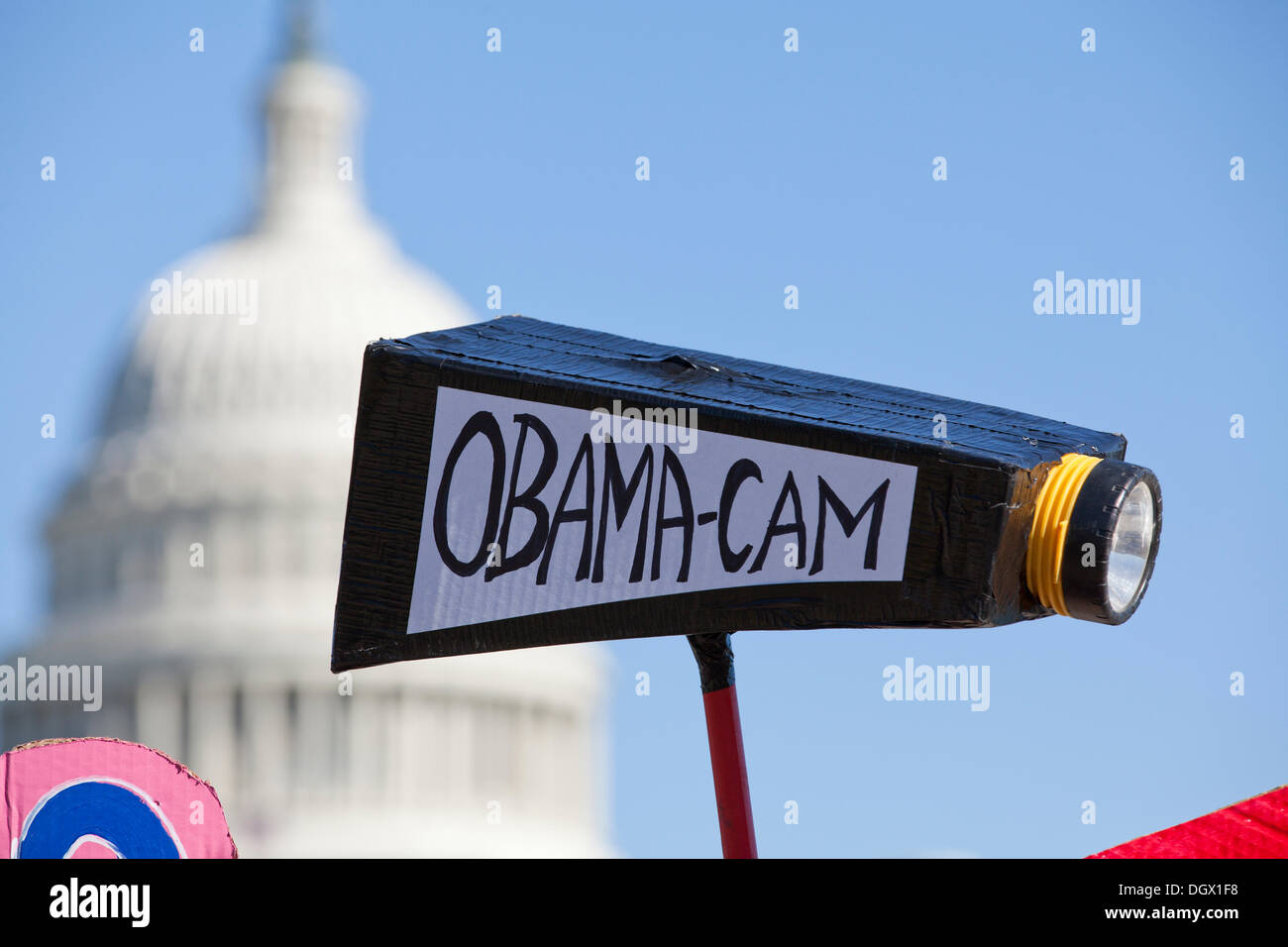 Washington, DC USA. 26th Oct, 2013. :  Thousands of citizens and many public advocacy organizations gather to rally on Capitol Hill in protest, resulting from recent  reports of domestic and international surveillance by the NSA © B Christopher/Alamy Live News Stock Photo