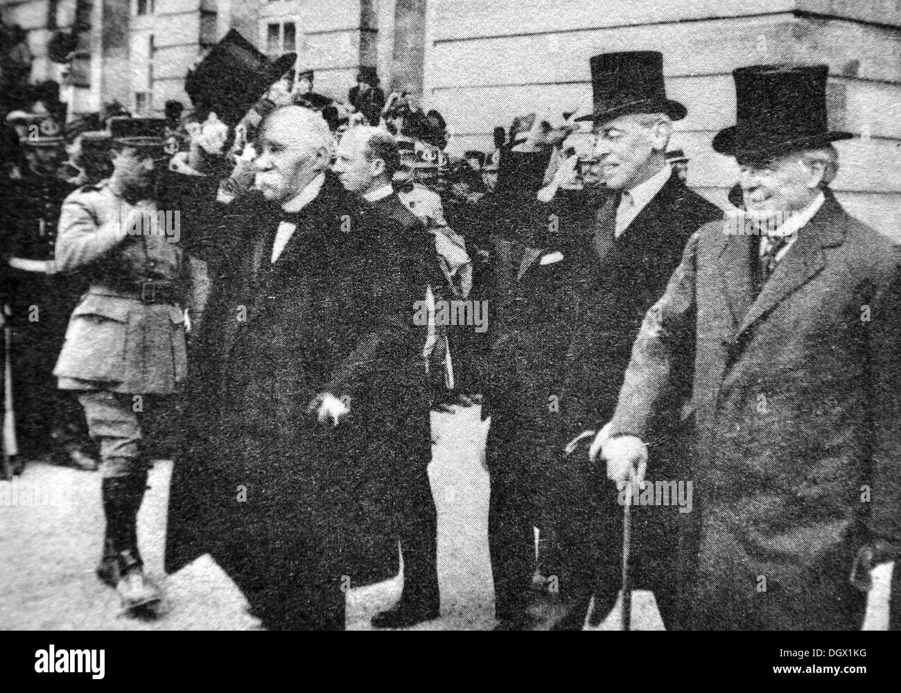 Old photograph of Georges Clemenceau, Woodrow Wilson and David  Lloyd George at the signing of the Treaty of Versailles, 1919 Stock Photo