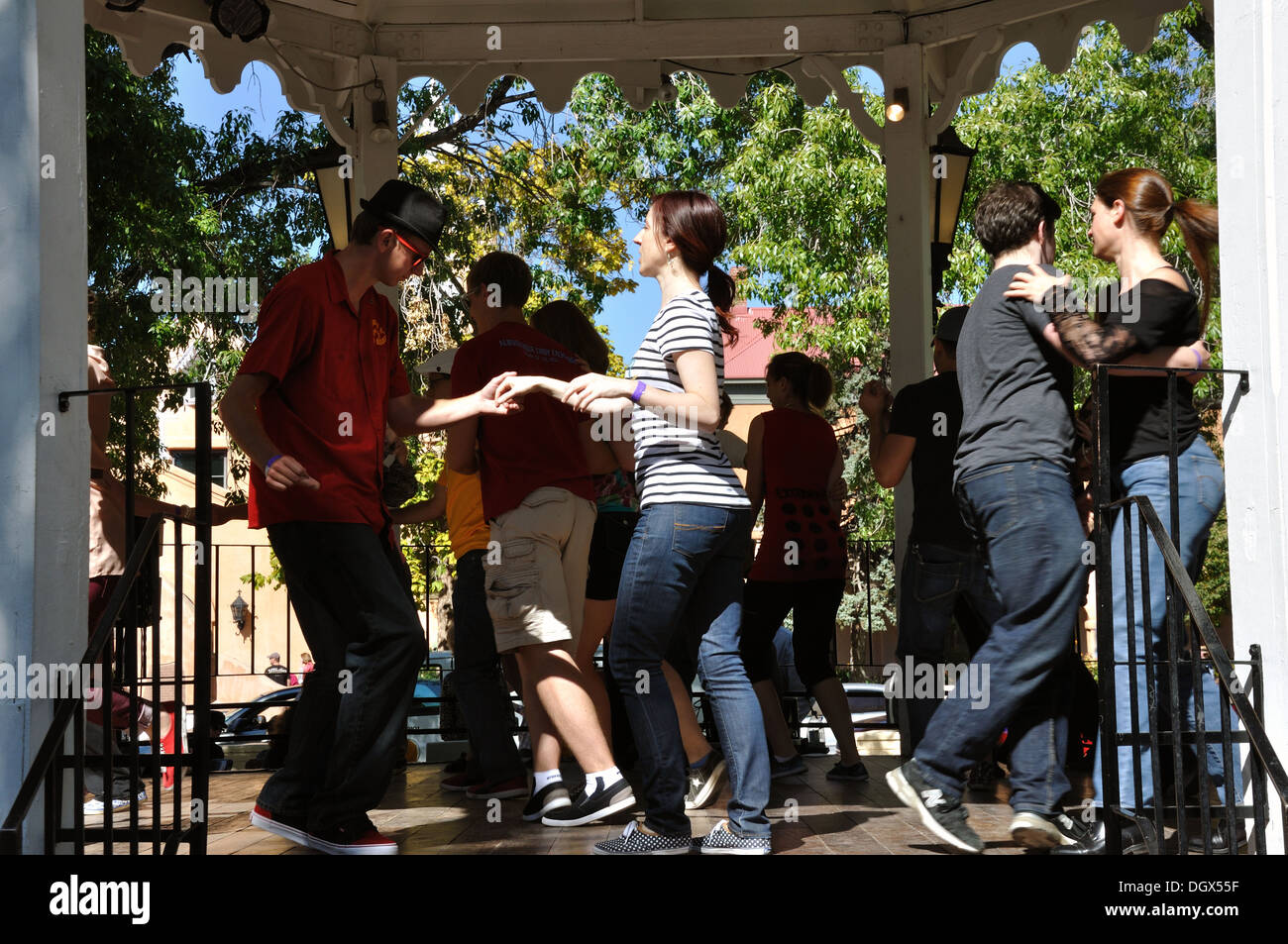 Youth dancing in the gazebo in Old Town's Main Plaza, Albuquerque, New Mexico, USA Stock Photo