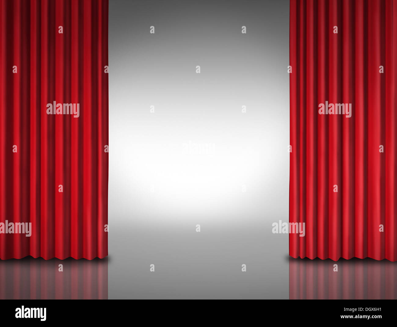 Entertainment background for movie performances at a glossy theater stage or store opening with opened red velvet drapes or curtains revealing a glowing white background. Stock Photo