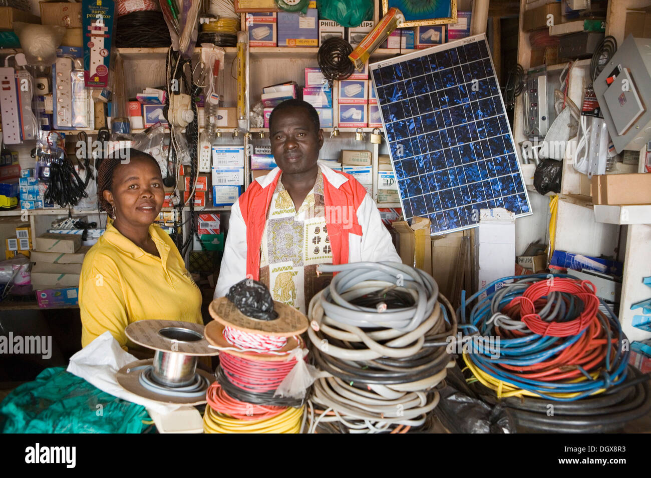 Mr and Mrs Tinkasimire, owners of an electrical shop, offering Stock