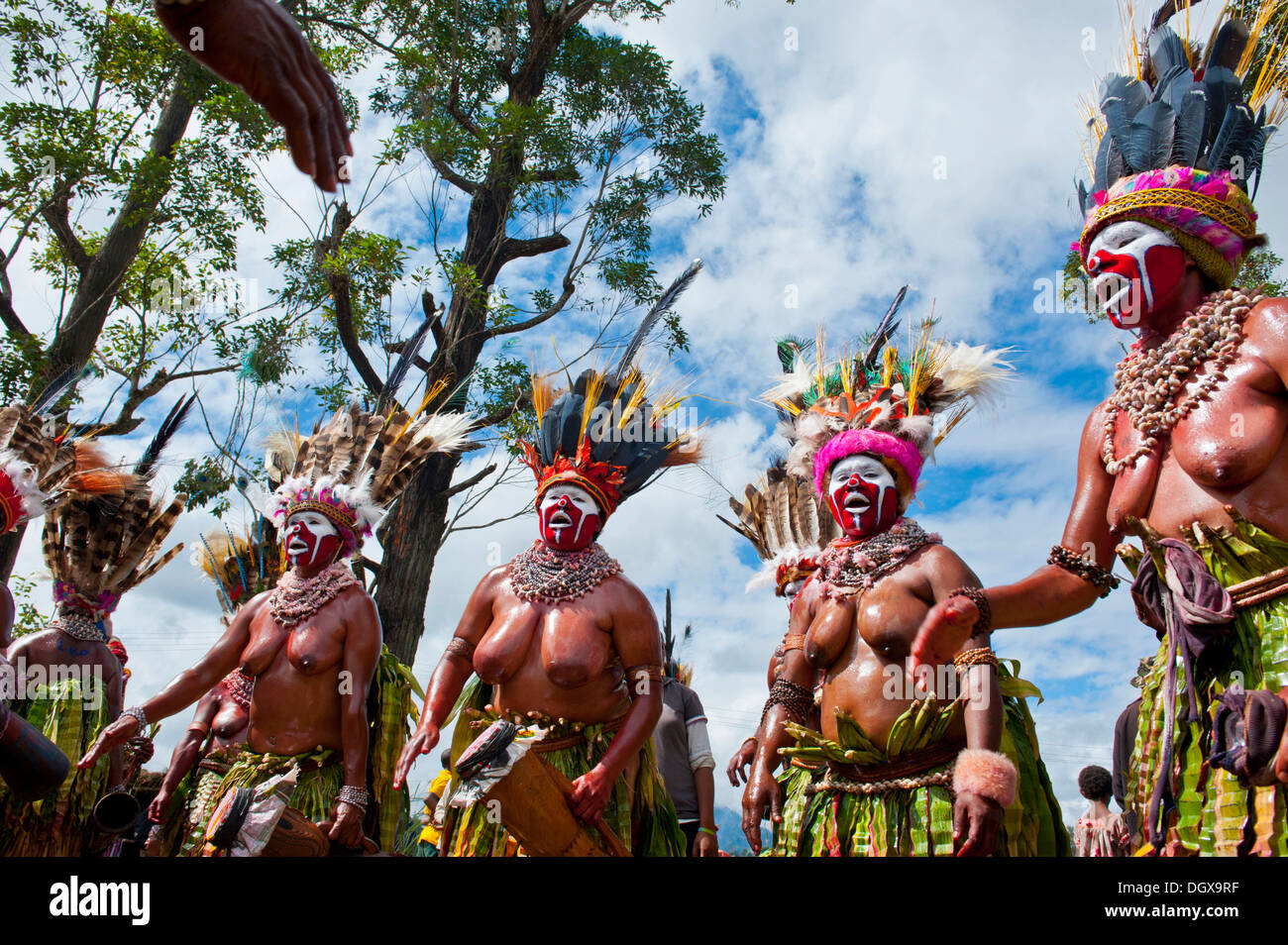 Women in colourfully decorated costumes with face paint at the Stock