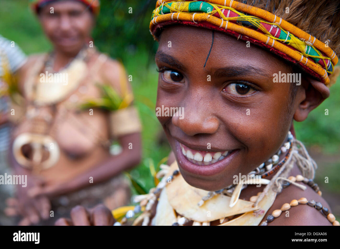 A girl in a colourful costume is celebrating at the traditional sing Sing gathering in the Highlands, Paya, Papua New Guinea Stock Photo