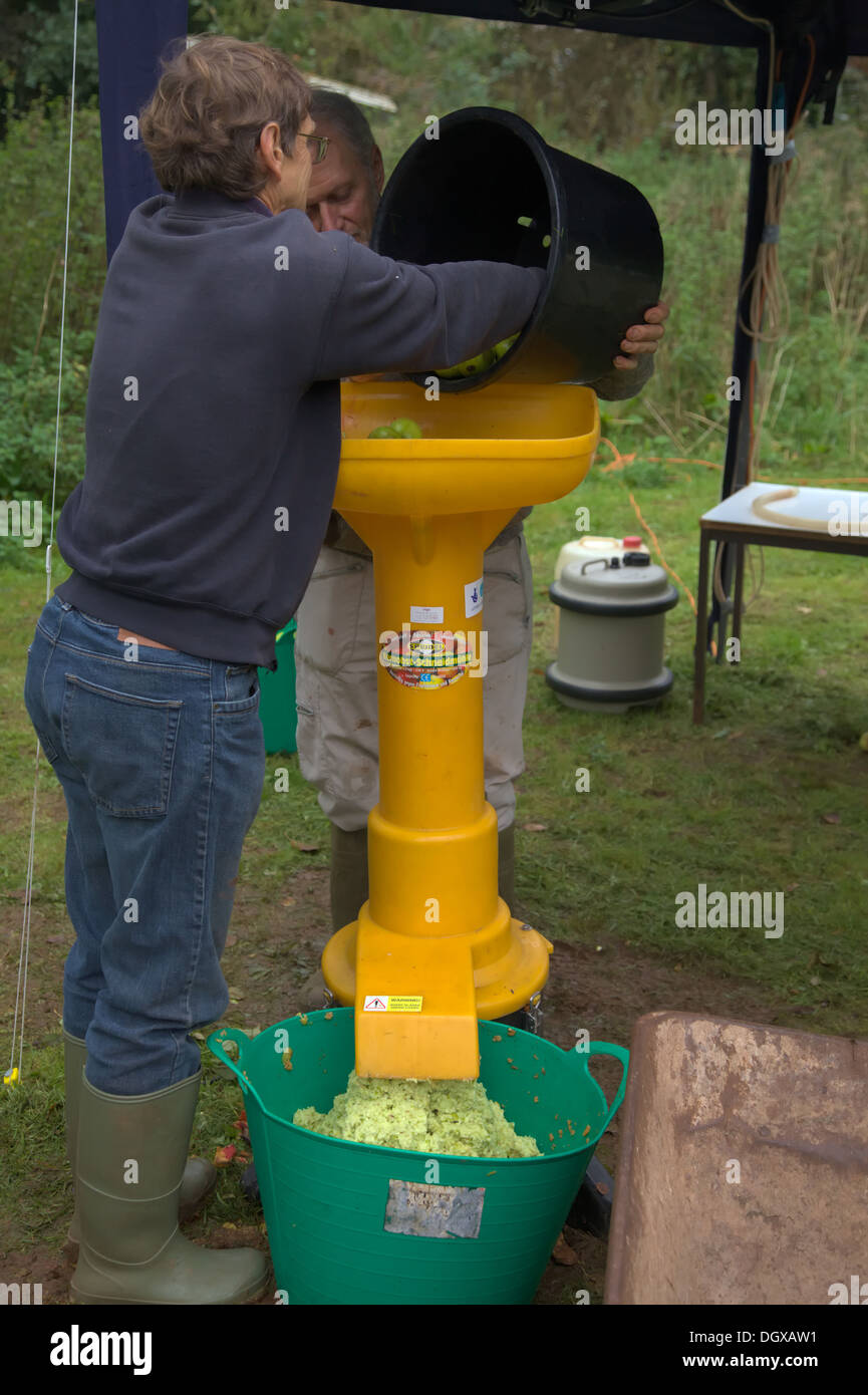 Speidel Electric Apple Mill in use at Community apple juicing day in
