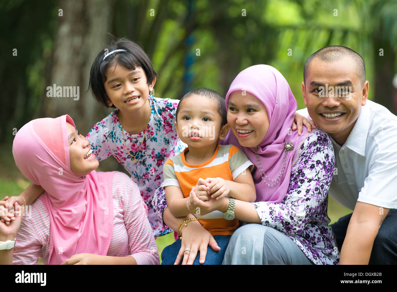 malay family having fun in the park ,malaysian people ...