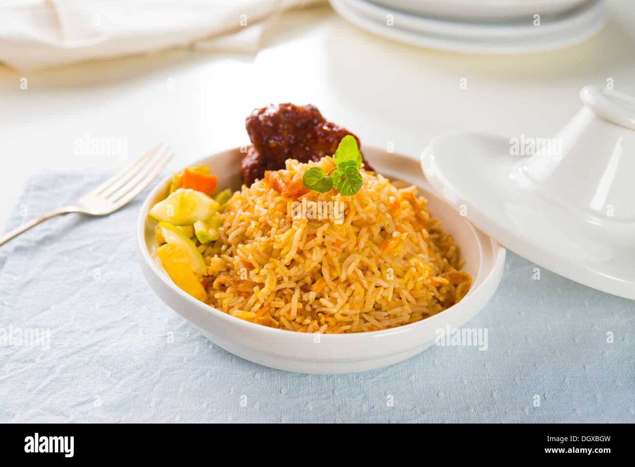 Biryani chicken rice cooked in arab style tajine with traditional india ...