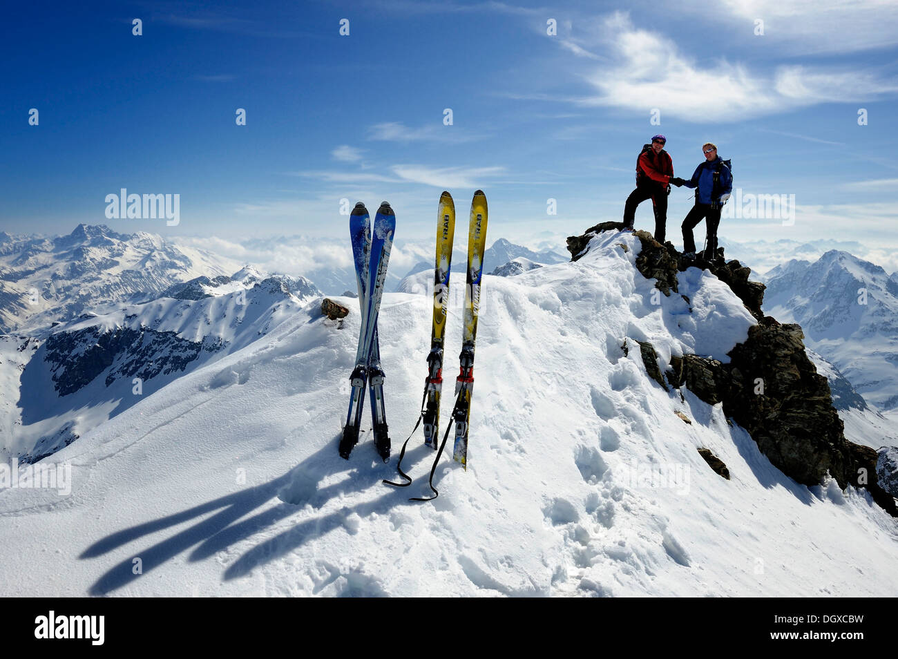 Ski mountaineers on the summit with mountain scenery, Julier Pass, Grisons, Switzerland, Europe Stock Photo